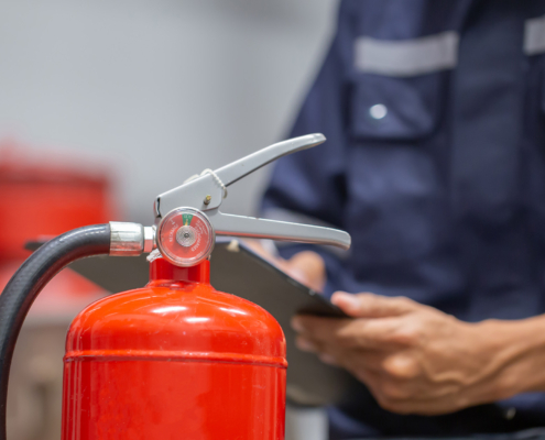 Engineer are checking and inspection a fire extinguishers tank