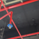Industrial ceiling infrastructure featuring red fire sprinkler pipes